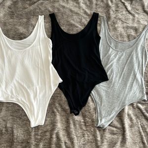 3 pack of neutral body suits Size Small